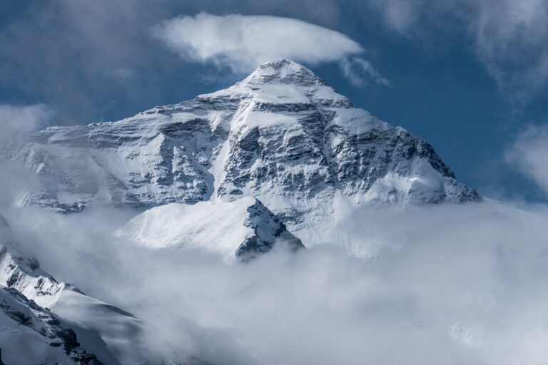 snow covered mountain under blue sky during daytime